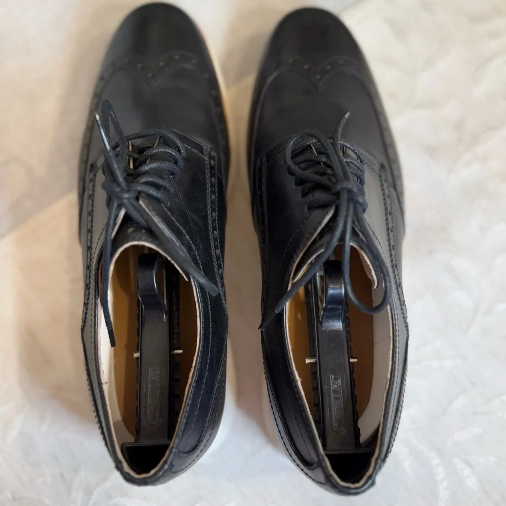 Cole Haan ØriginalGrand Wingtip Oxford in Black Leather with White Model #C26469
